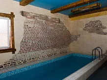 Отделка декоративным камнем саун и бассейнов фото 1